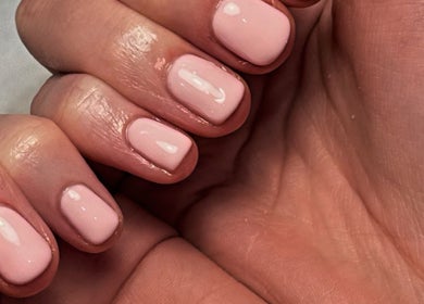 Close-up of a stylish light pink manicure at Georgia May Therapies, Shrewsbury, England, GB.