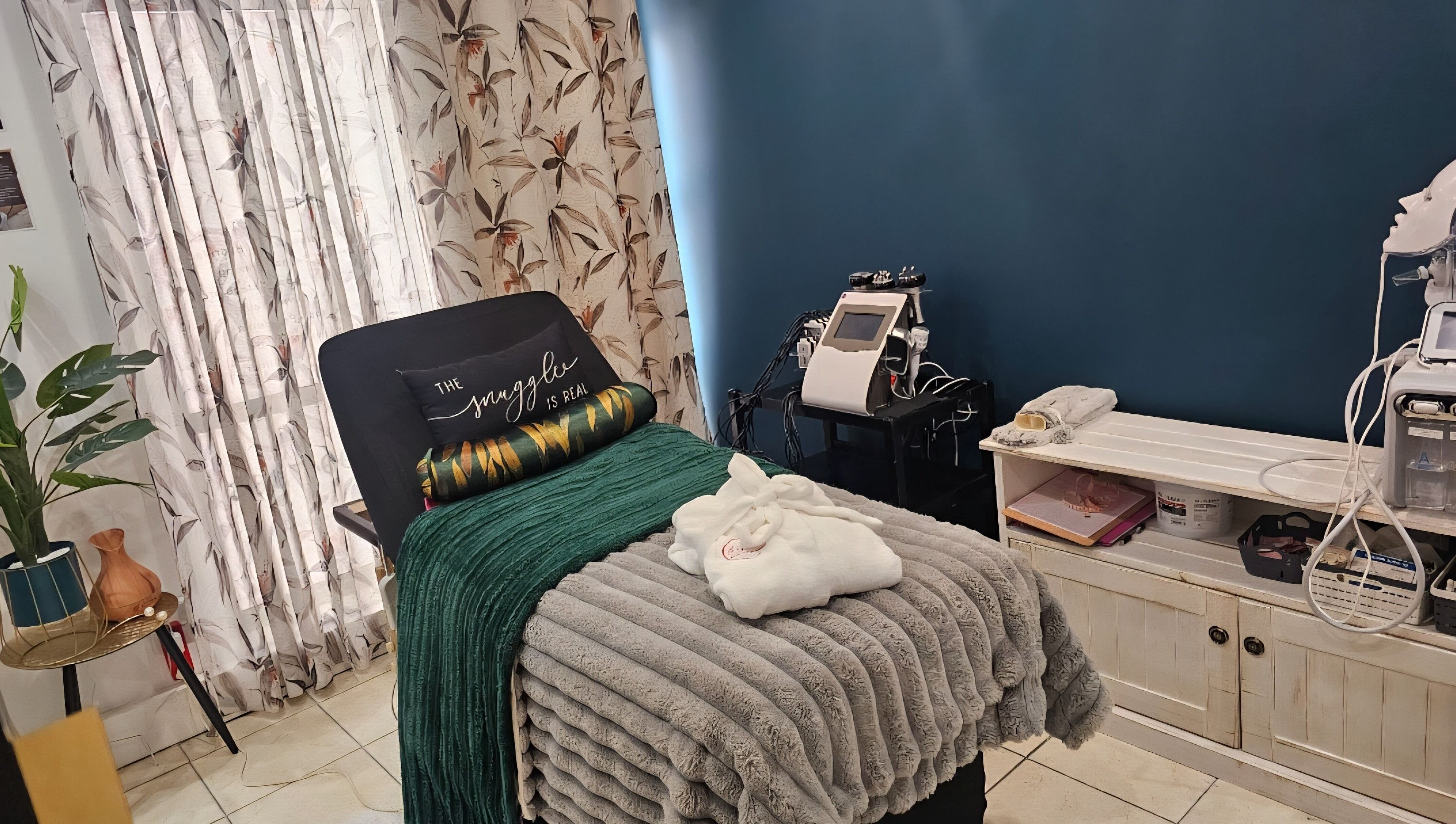 Relaxing treatment room at The Firm Elegance in Beauty, Cape Town, Western Cape, ZA with plush decor and wellness equipment.