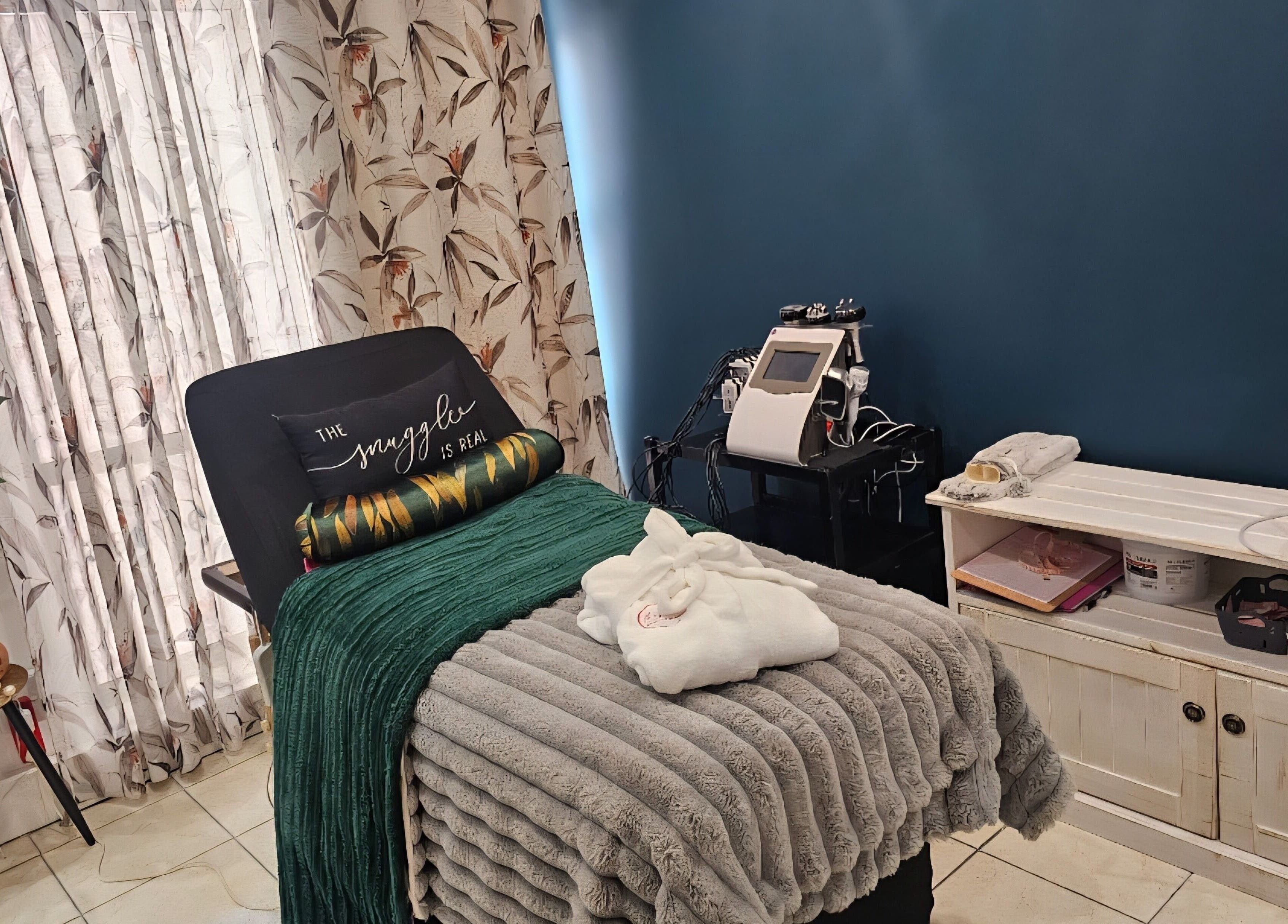Relaxing treatment room at The Firm Elegance in Beauty, Cape Town, Western Cape, ZA with plush decor and wellness equipment.