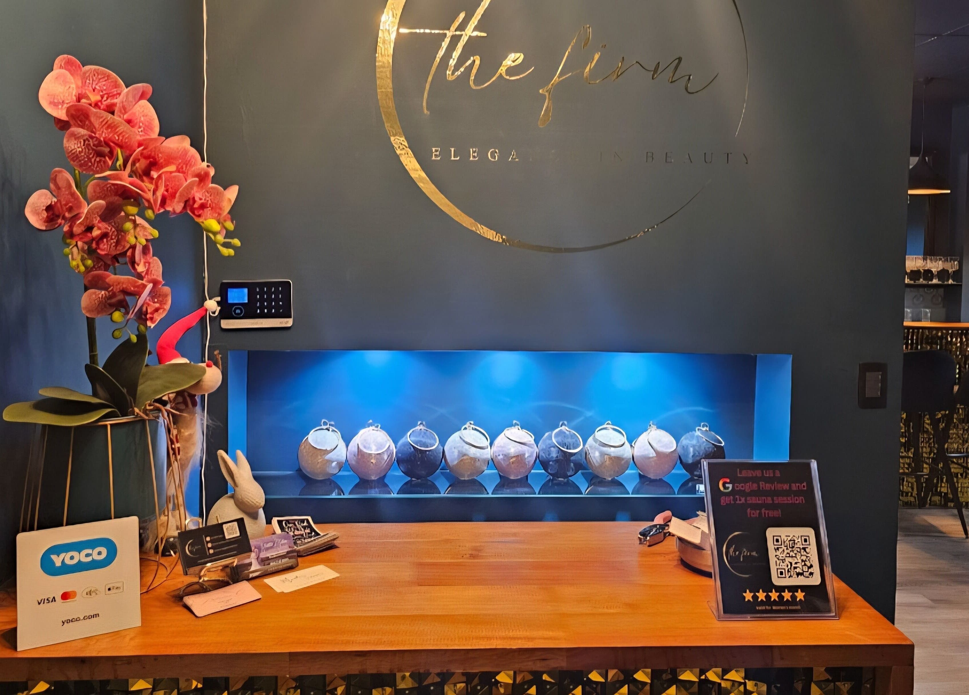 Reception at The Firm Elegance in Beauty, Cape Town, Western Cape, ZA showcasing sophisticated decor and warm ambiance.