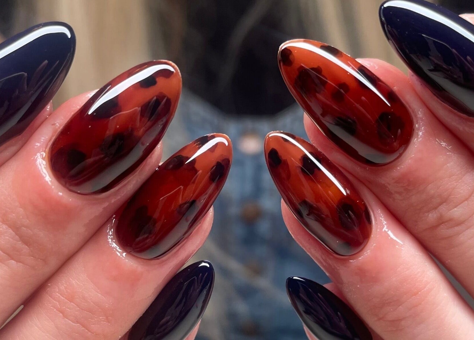 Elegant nail art in black and maroon at Montanna Here 2 Glow, London, Ontario, CA.