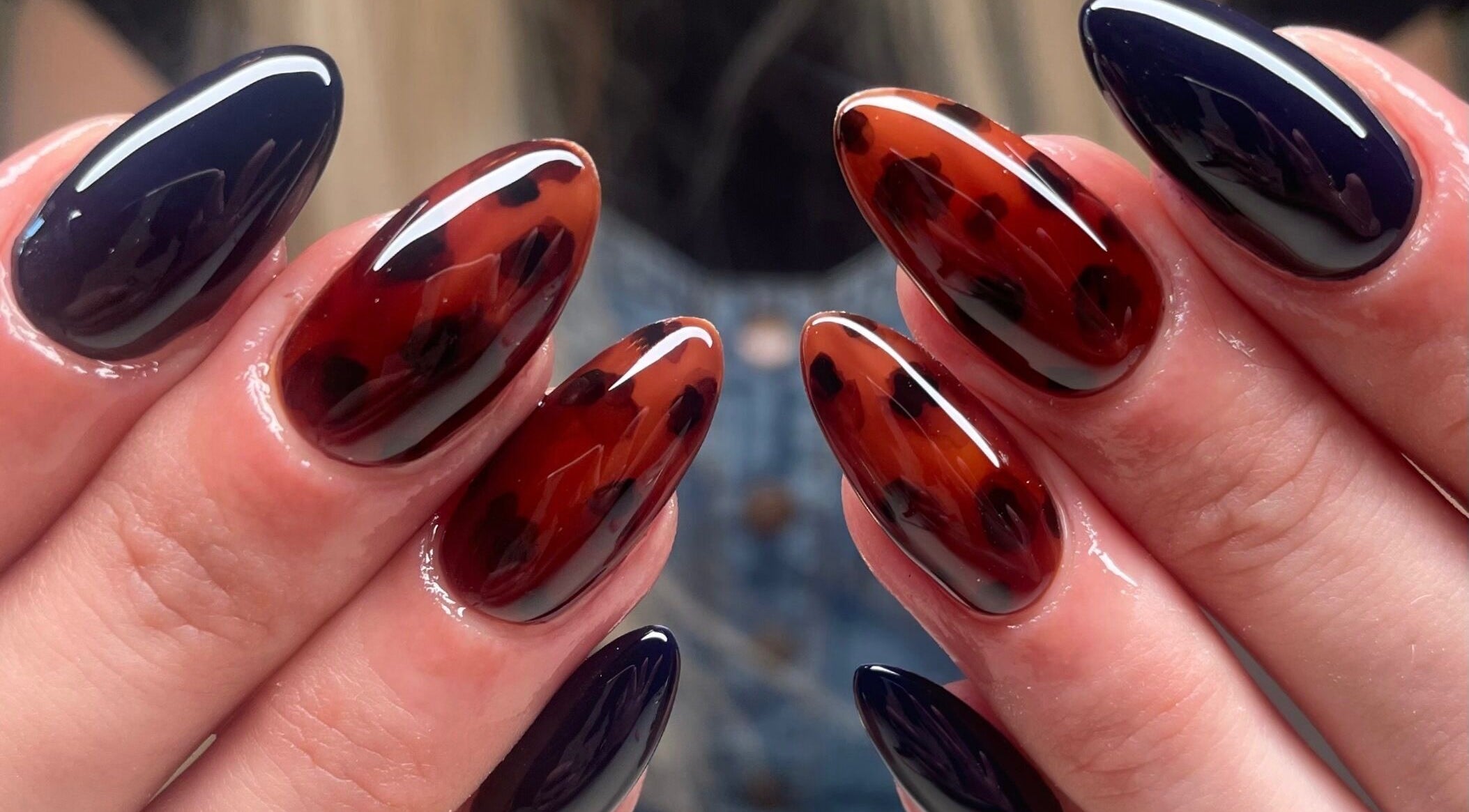 Elegant nail art in black and maroon at Montanna Here 2 Glow, London, Ontario, CA.