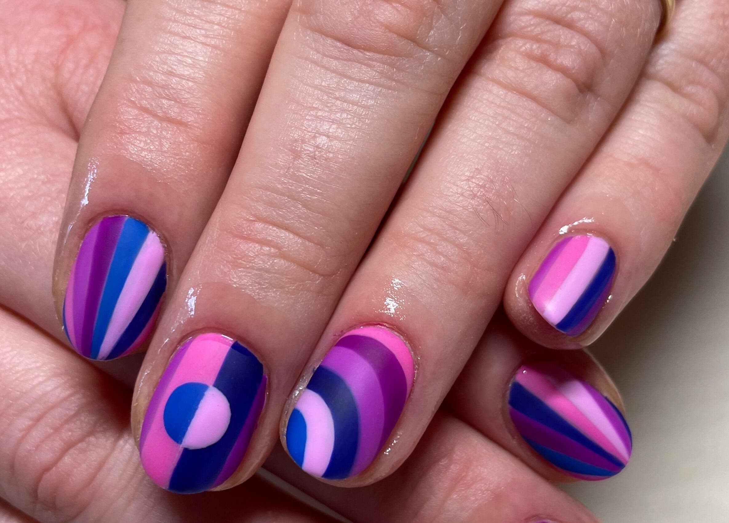 Colorful geometric nail design at Montanna Here 2 Glow, London, Ontario, CA.