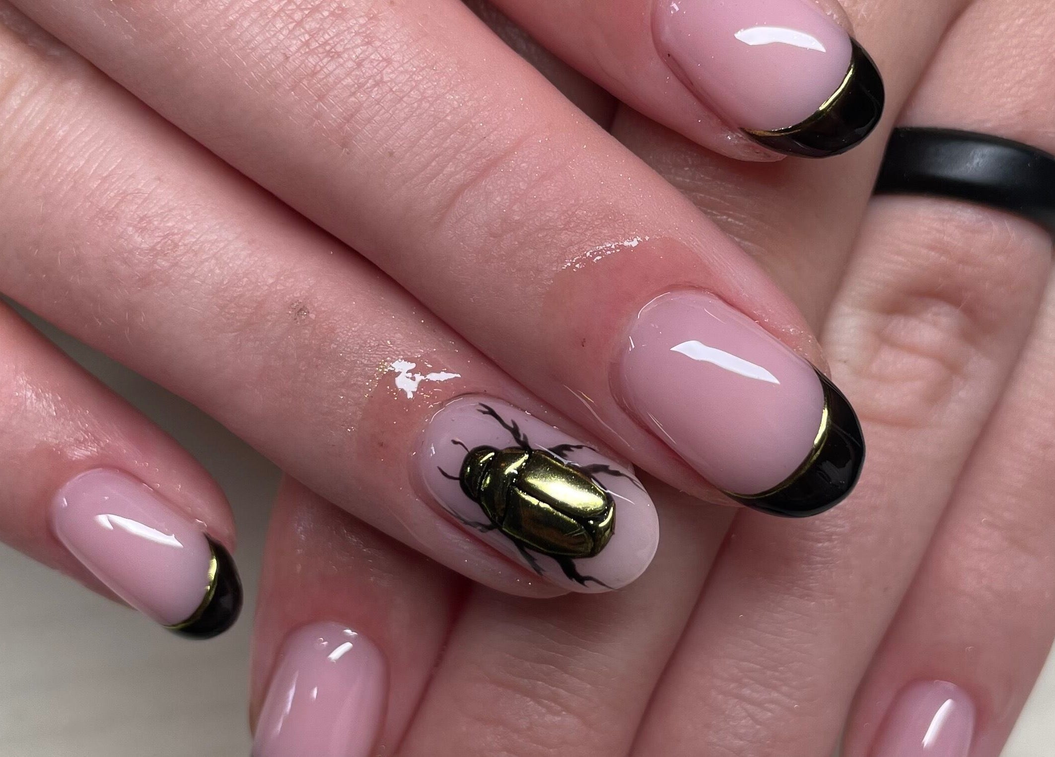 Beetle nail art with black tips at Montanna Here 2 Glow, London, Ontario, CA.