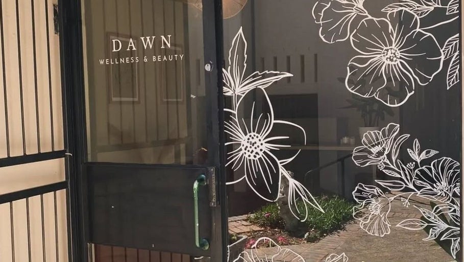 Entrance to Lashes by Nadine in Wellington, Western Cape, ZA, featuring floral glass designs.