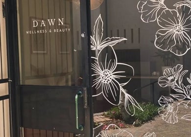 Entrance to Lashes by Nadine in Wellington, Western Cape, ZA, featuring floral glass designs.