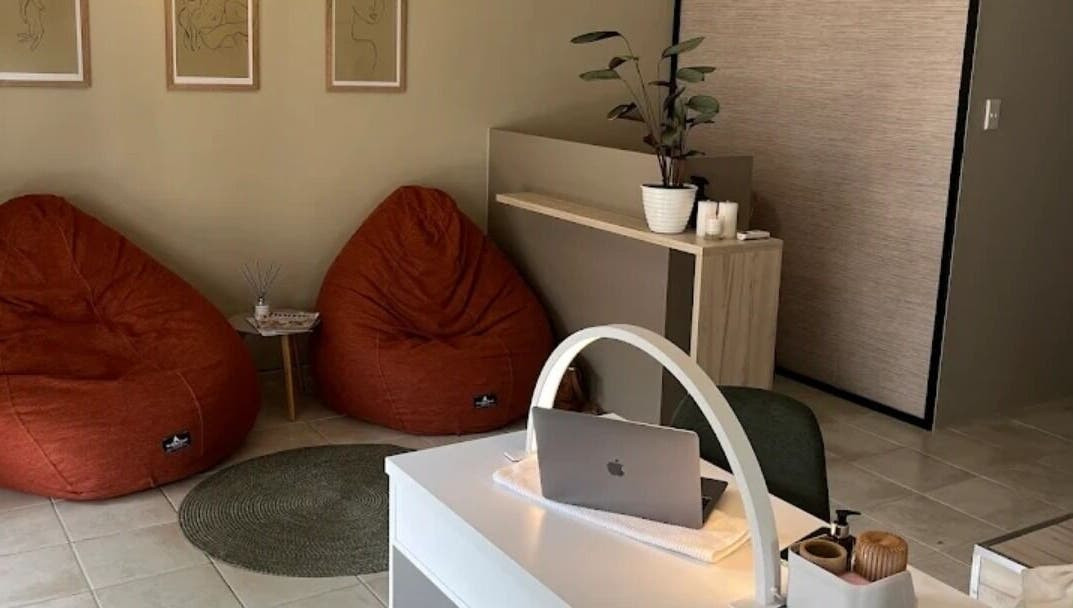 Welcoming lounge area with modern decor at Nadine at Dawn Wellness and Beauty, Wellington, Western Cape, ZA.
