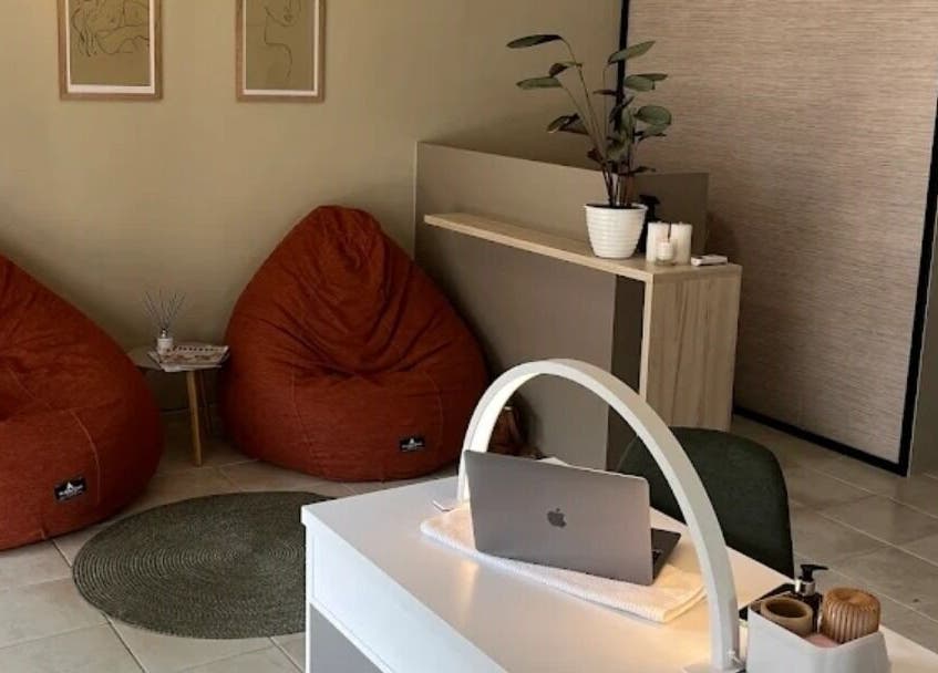 Welcoming lounge area with modern decor at Nadine at Dawn Wellness and Beauty, Wellington, Western Cape, ZA.
