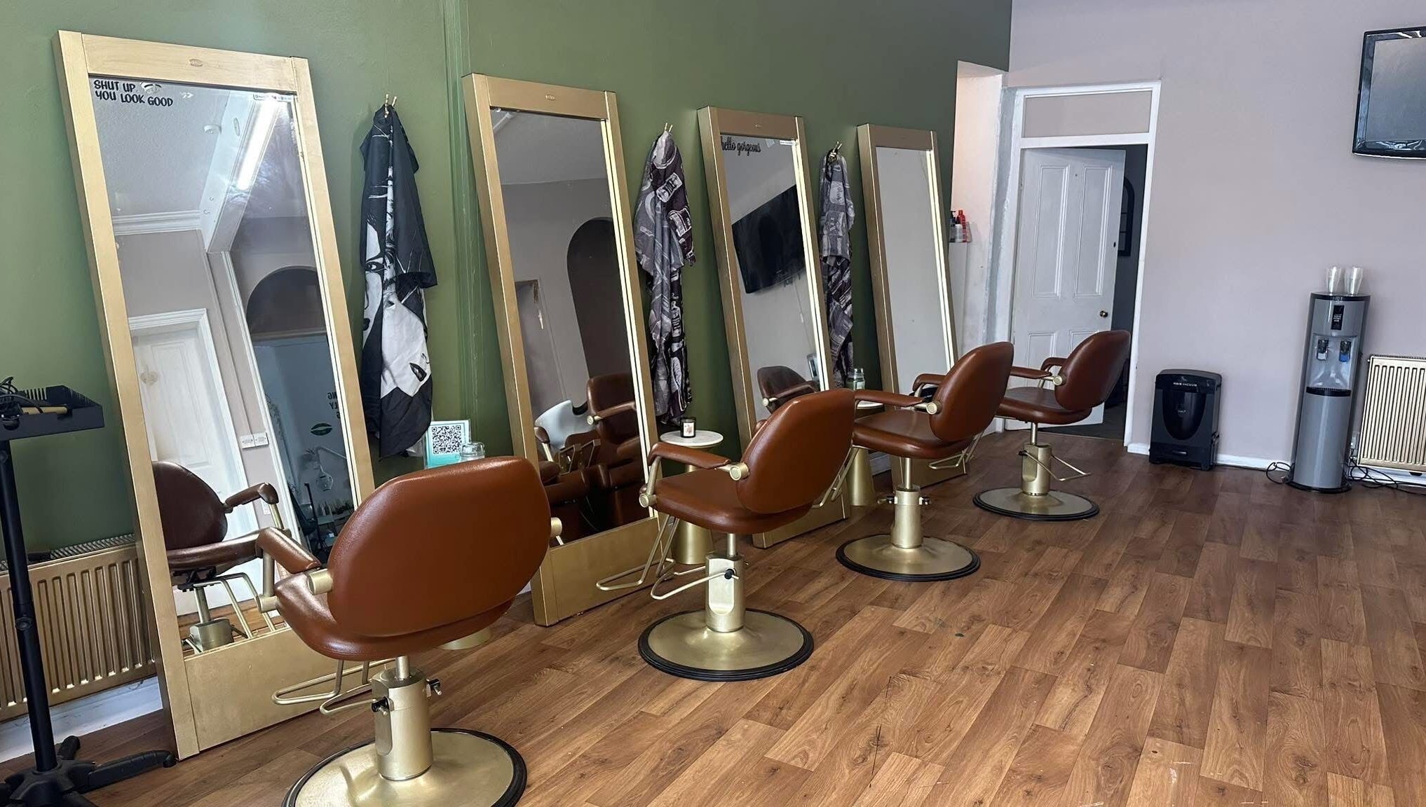 Stylish salon chairs and mirrors at Hair By Amy in Oswestry, England, GB, offering a chic beauty experience.