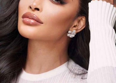 Elegant woman with glossy hair at My Diamond Hair, Lagos, Lagos, NG.