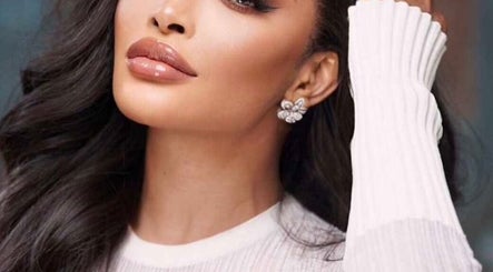 Elegant woman with glossy hair at My Diamond Hair, Lagos, Lagos, NG.