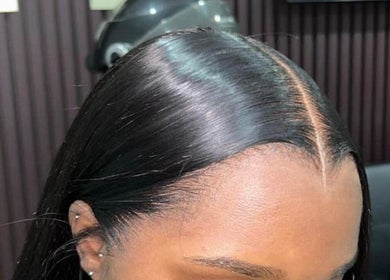 Shiny black hair with center part styled at My Diamond Hair, Lagos, Lagos, NG.