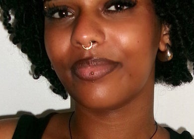 Model with stylish piercings at LuxeLashUk in Hornchurch, England, GB showcasing beauty and wellness.