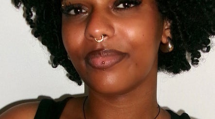 Model with stylish piercings at LuxeLashUk in Hornchurch, England, GB showcasing beauty and wellness.