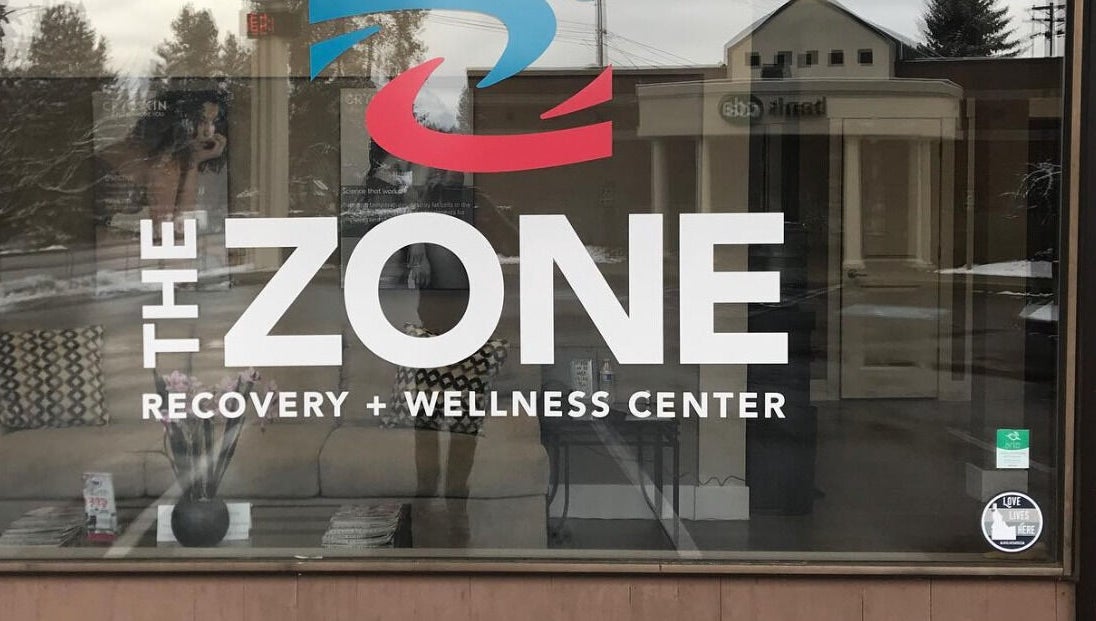 The Zone Recovery and Wellness Center entrance in Coeur d'Alene, Idaho, US, featuring modern signage.