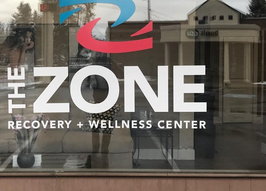The Zone Recovery and Wellness Center entrance in Coeur d'Alene, Idaho, US, featuring modern signage.