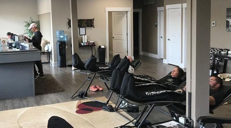 The Zone in Coeur d'Alene, Idaho, US features a modern relaxation lounge with reclining chairs for wellness.