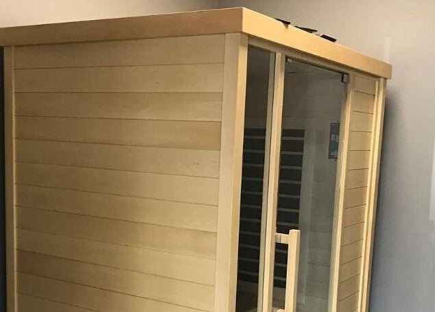 Wooden sauna room at The Zone in Coeur d'Alene, Idaho, US, offering relaxation and wellness.