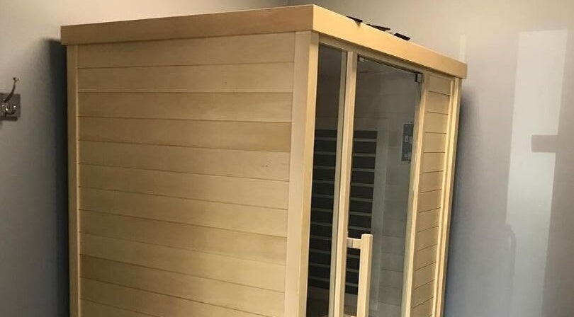 Wooden sauna room at The Zone in Coeur d'Alene, Idaho, US, offering relaxation and wellness.