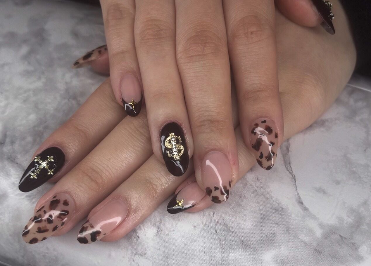 Stylish leopard print and gold nail art at Glam Tech Tiana, Burnaby, British Columbia, CA.