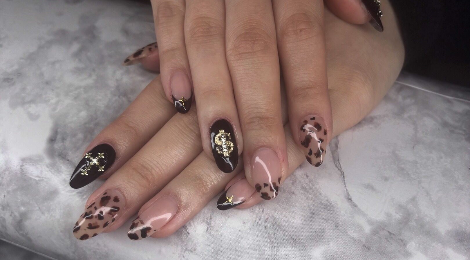 Stylish leopard print and gold nail art at Glam Tech Tiana, Burnaby, British Columbia, CA.