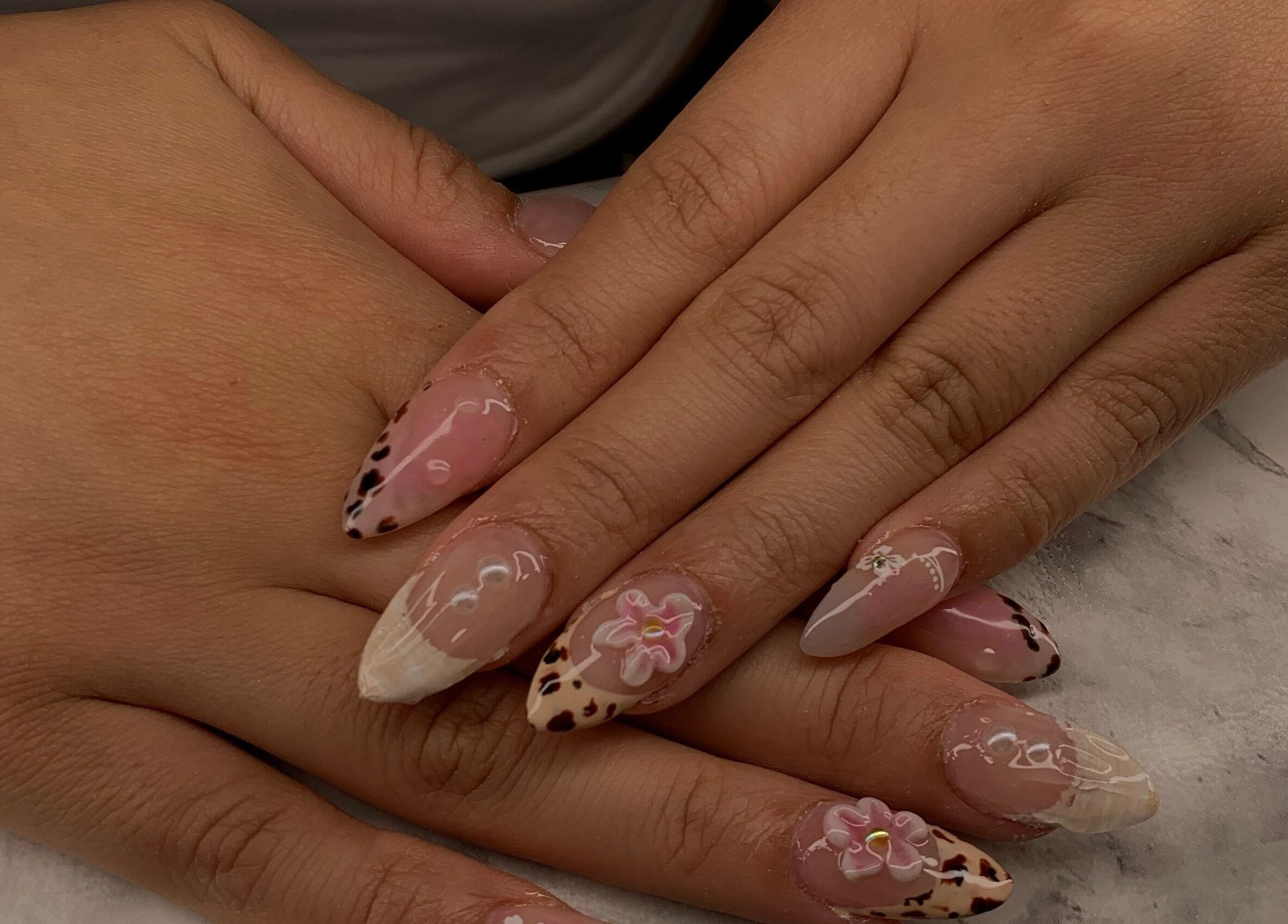 Intricate floral and animal print nail art at Glam Tech Tiana, Burnaby, British Columbia, CA.