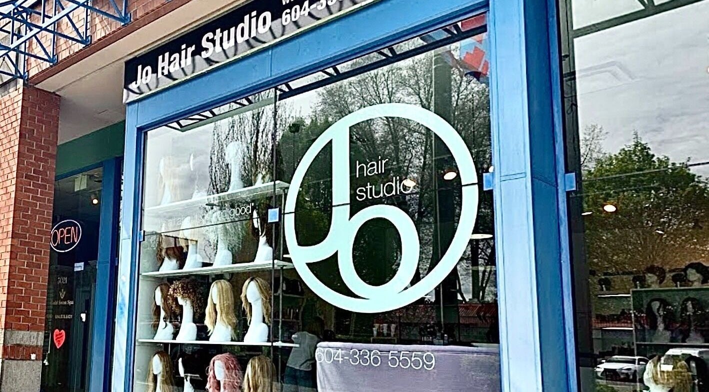 Front view of Jo Hair Studio Vancouver showcasing stylish wigs on display in Vancouver, British Columbia, CA.