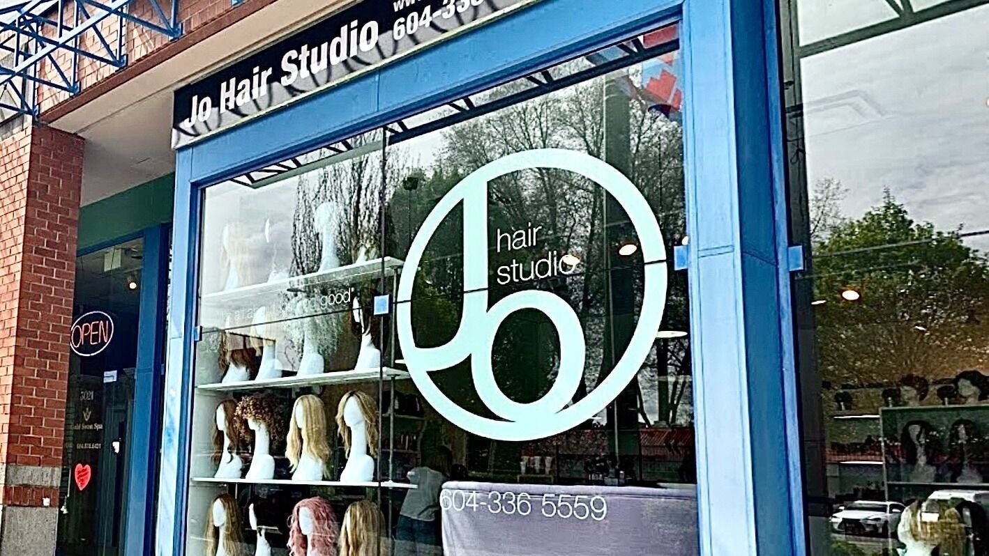 Front view of Jo Hair Studio Vancouver showcasing stylish wigs on display in Vancouver, British Columbia, CA.