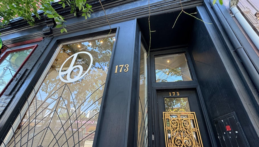 Elegant entrance of Jo Hair Studio Toronto on 173, Toronto, Ontario, CA, showcasing modern design.