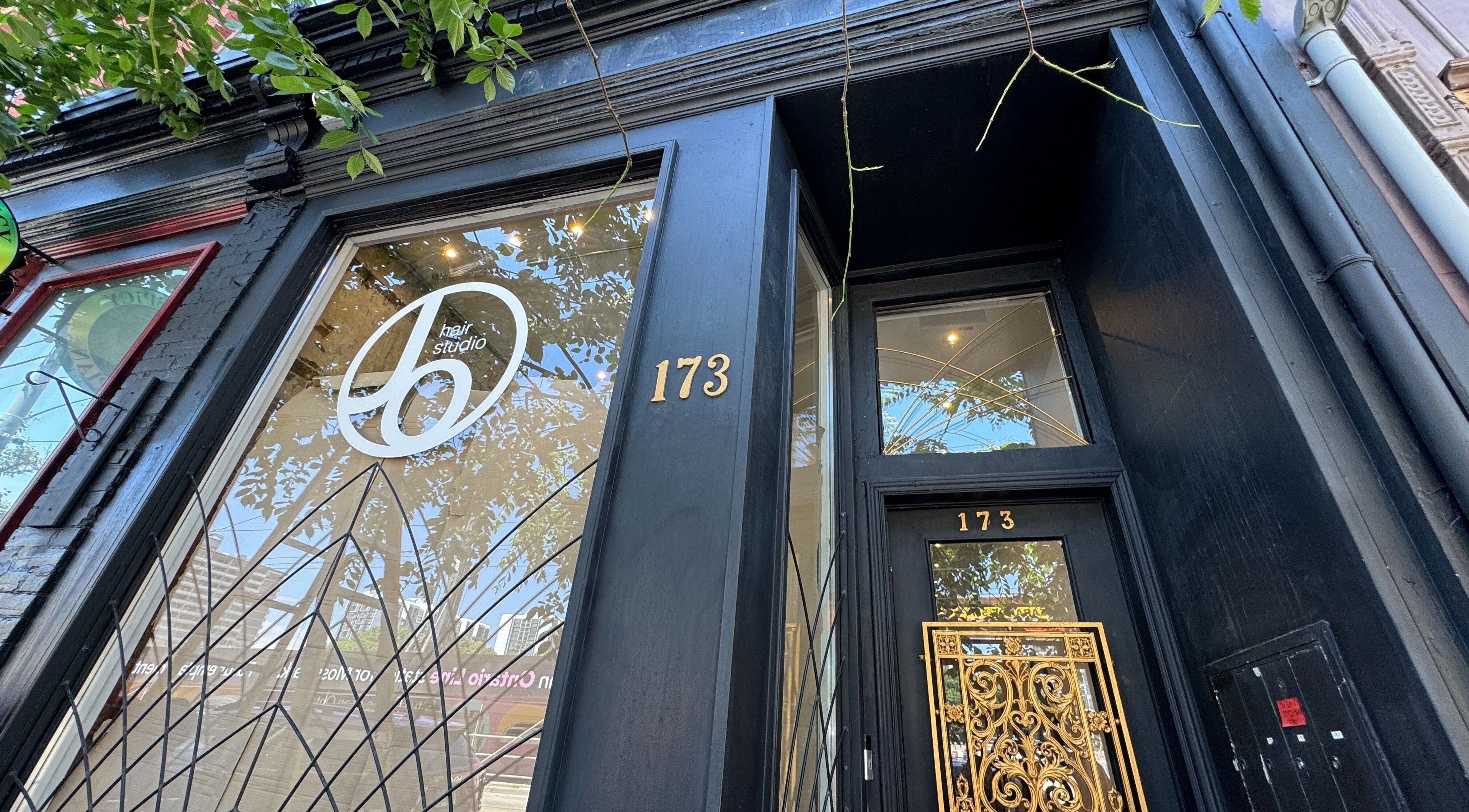 Elegant entrance of Jo Hair Studio Toronto on 173, Toronto, Ontario, CA, showcasing modern design.