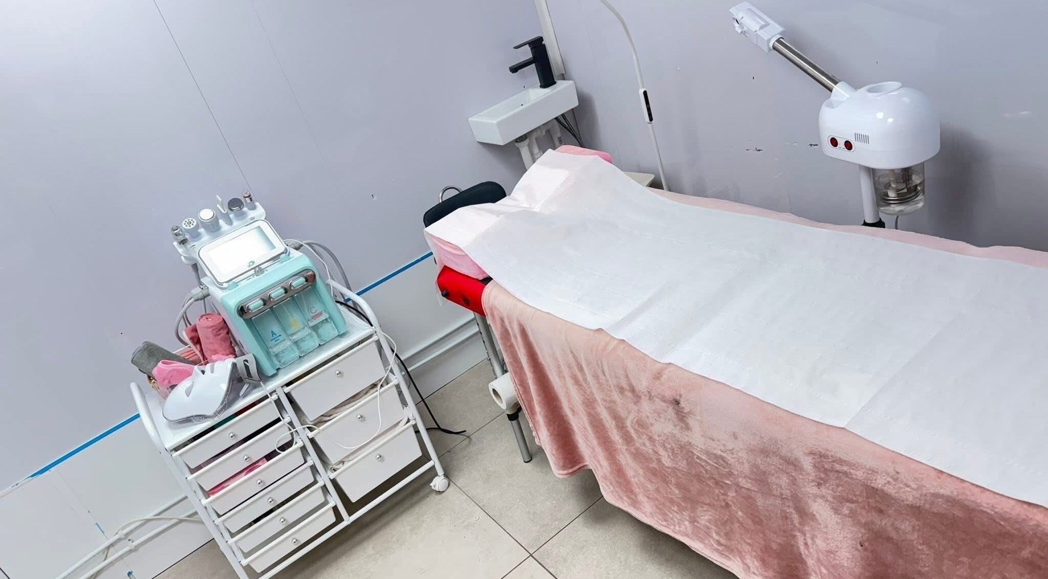 Luxurious spa room setup at Vees Vmc, Birmingham, England, GB with high-end equipment for facial treatments.