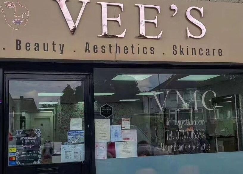 Vees Vmc in Birmingham, England, GB with elegant signage for hair and beauty services.