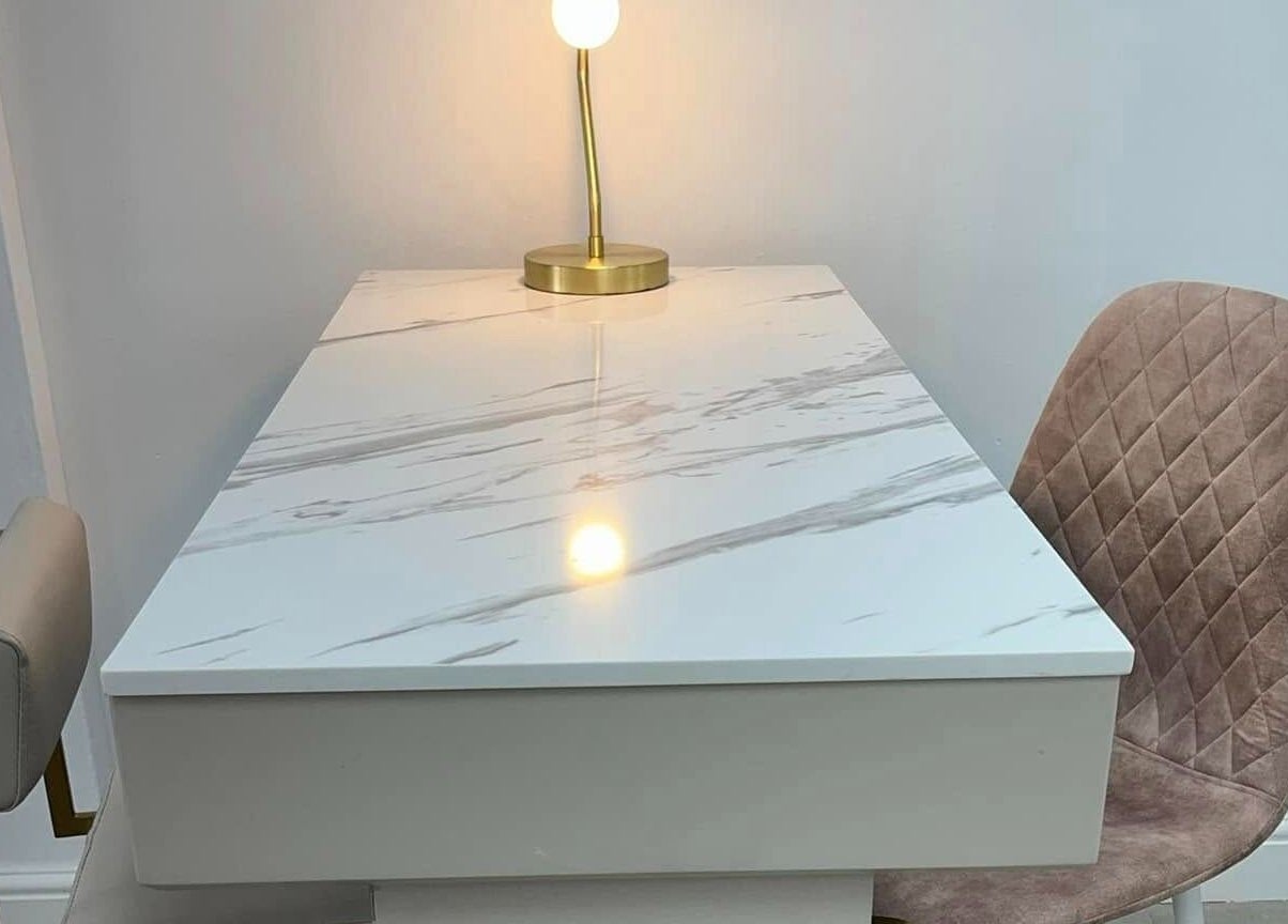Chic marble manicure table with lamp at Vees Vmc, Birmingham, England, GB.