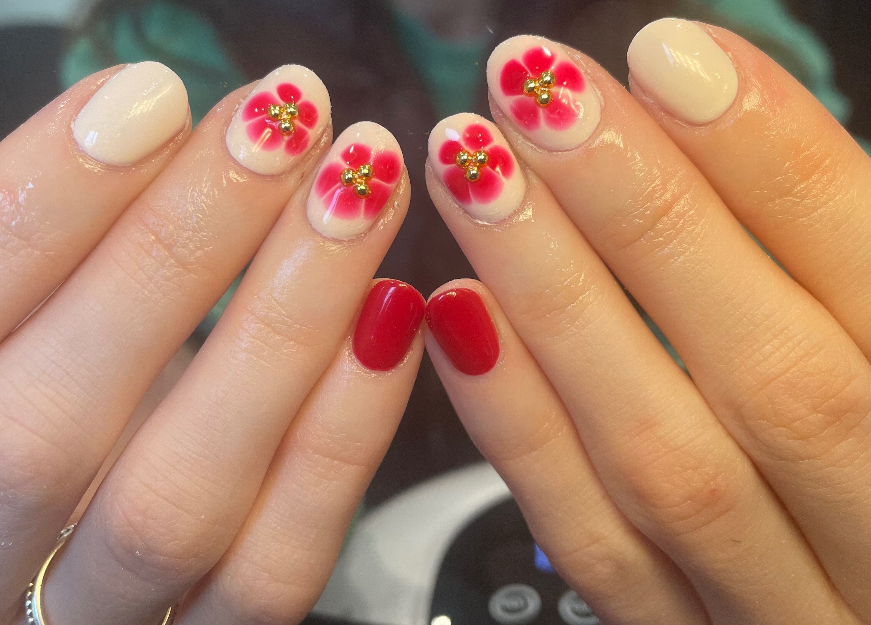 Red and floral nail art at Nails by Lilly Brooke, Tenbury Wells, England, GB.