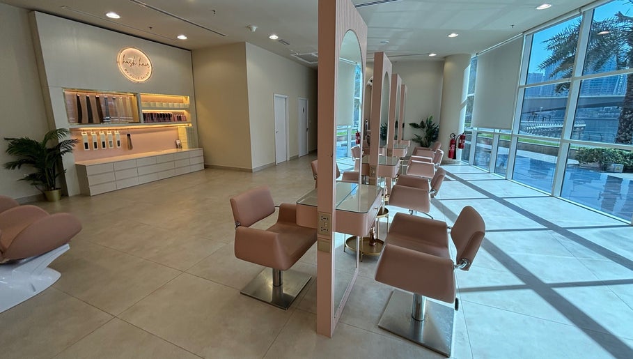 Modern interior of Pose Salon, Dubai, Dubai, AE, featuring stylish seating and ample natural light.
