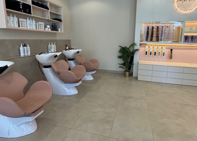 Modern hair wash stations at Pose Salon, Dubai, Dubai, AE, offering a relaxing and luxurious atmosphere.