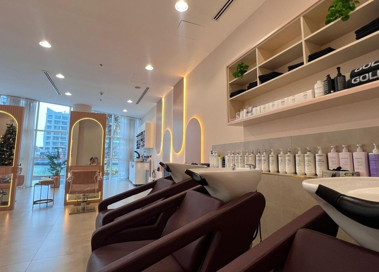 Modern InHair Salon in Dubai, Dubai, AE features elegant wash stations and bright, stylish design.