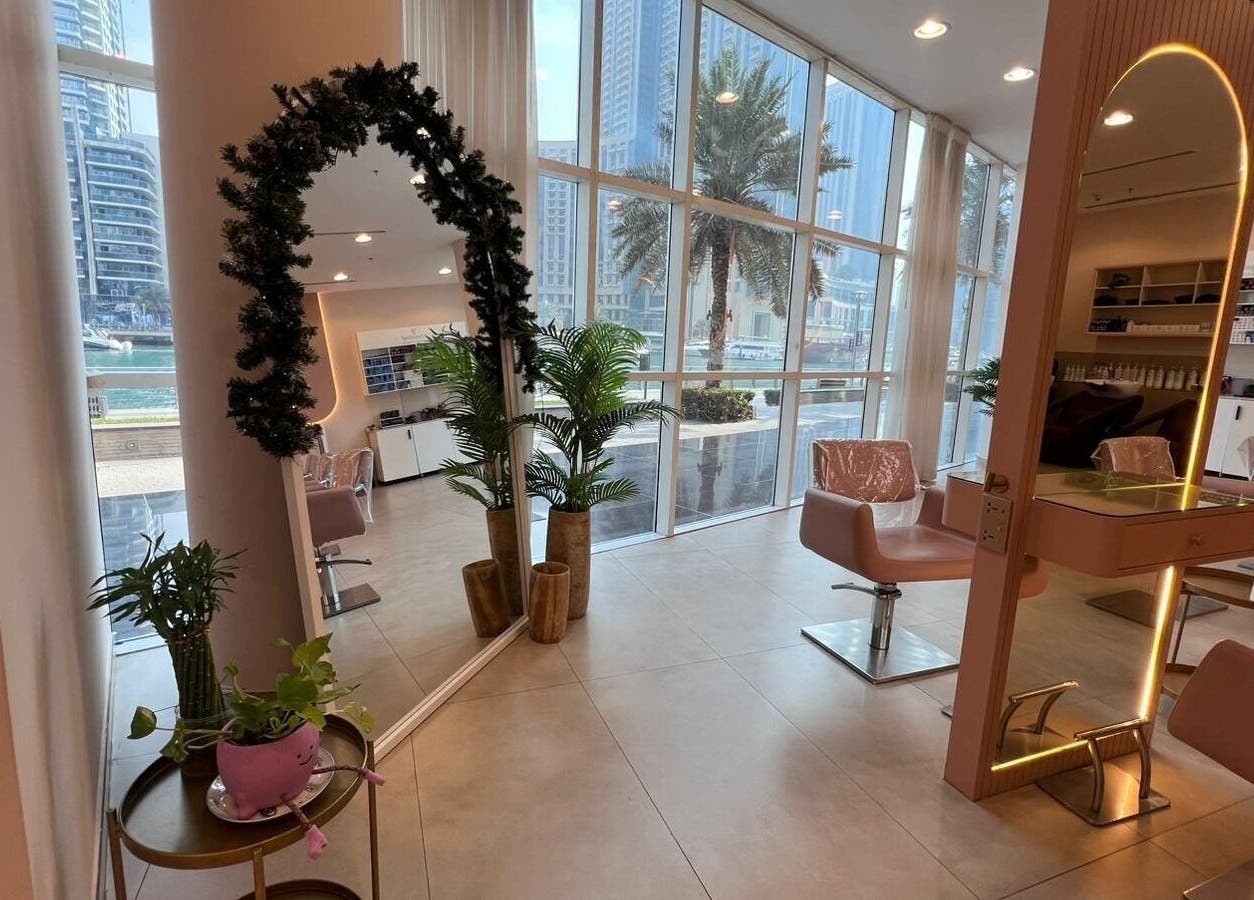 Stylish interior of InHair Salon with modern decor and city view in Dubai, Dubai, AE.