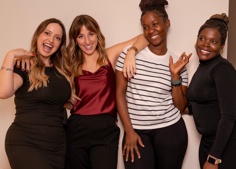 Happy team members at InHair Salon, Dubai, Dubai, AE, showcasing a friendly salon atmosphere.