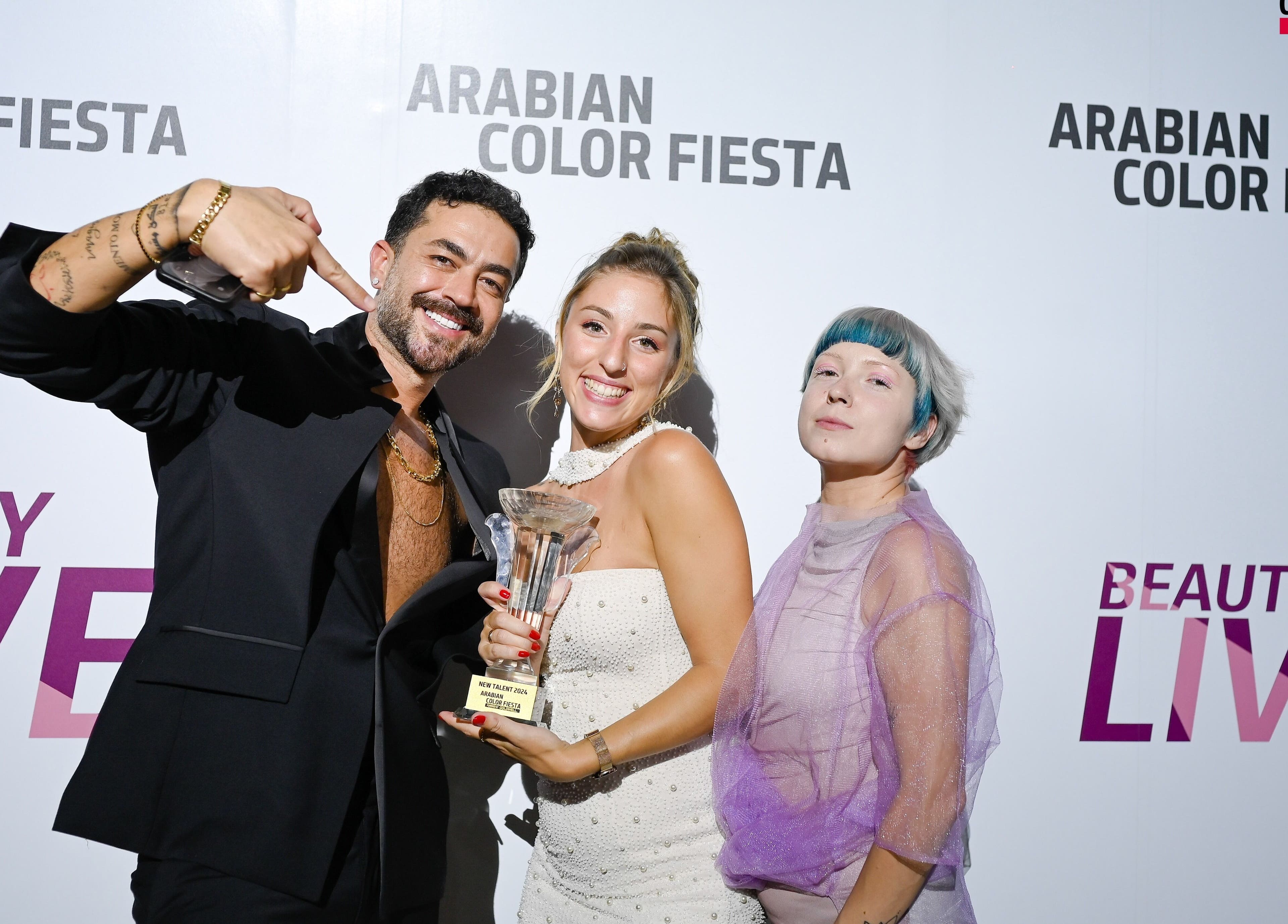 Happy winners at beauty event holding trophies at InHair Salon, Dubai, Dubai, AE.