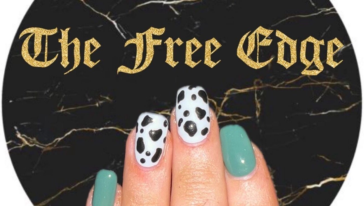 Stylish nail art at The Free Edge, Stornoway, Scotland, GB. Features black and aqua designs.