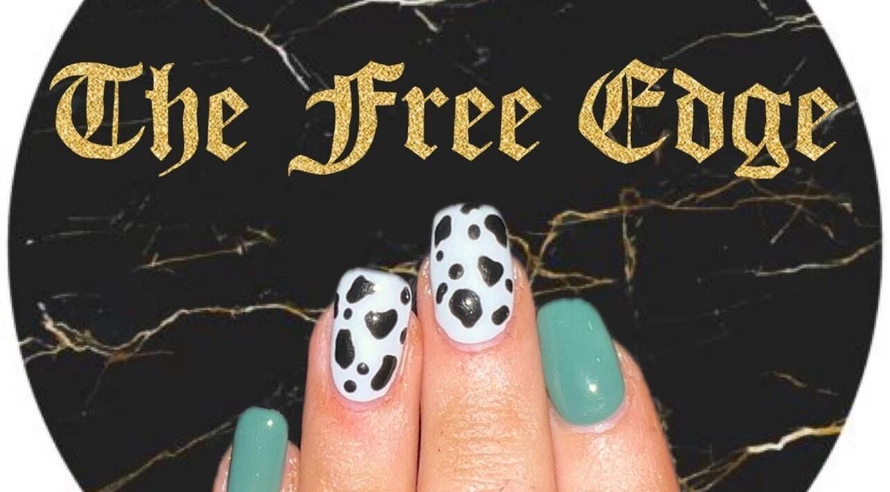 Stylish nail art at The Free Edge, Stornoway, Scotland, GB. Features black and aqua designs.