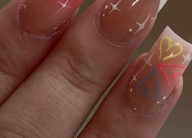Intricate nail art with colorful hearts at Plugged.by.s, Margate, England, GB.