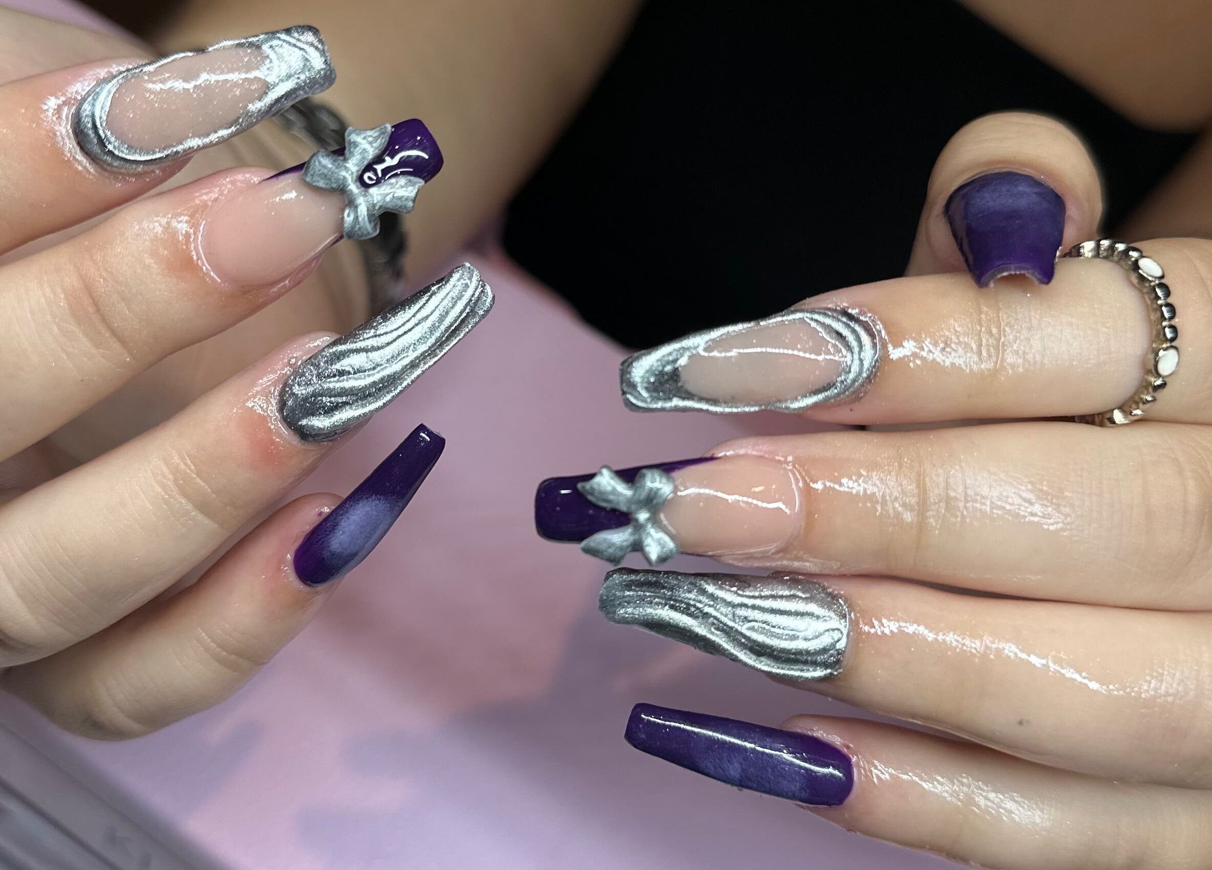 Stunning purple and silver nail art at Nailed it by Nattareeya, Saint Helier, St Helier, JE.