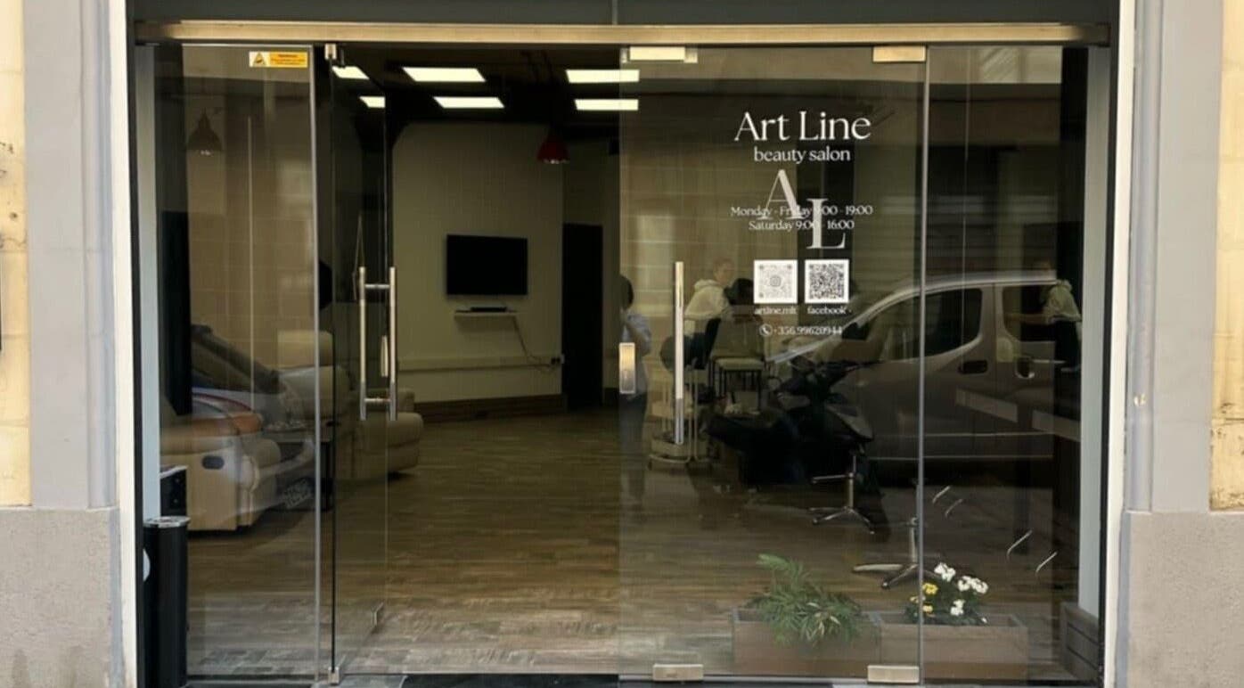 Front entrance of Art Line Beauty Salon in Il-Gżira, MT, MT featuring glass doors and modern decor.