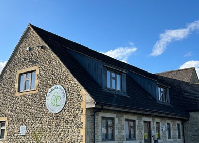 Exterior of Christie Louise Massage, a stone building in Cirencester, England, GB.