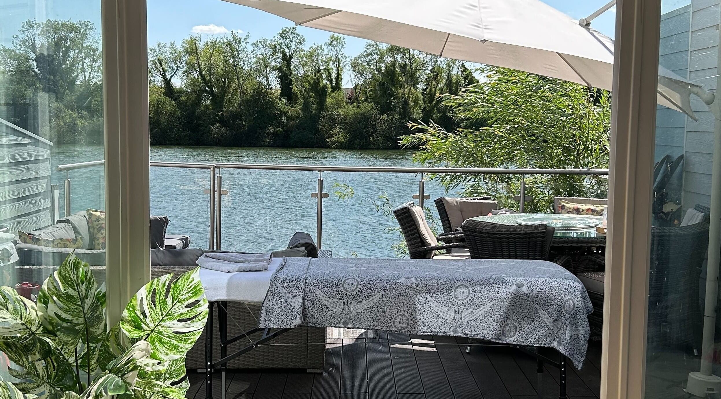 Riverside massage setting at Mobile Massage with Christie, England, England, GB, offering tranquility and comfort.