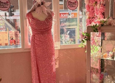 Pink sequin dress in window display at Platinum Empire, Newcastle upon Tyne, England, GB.