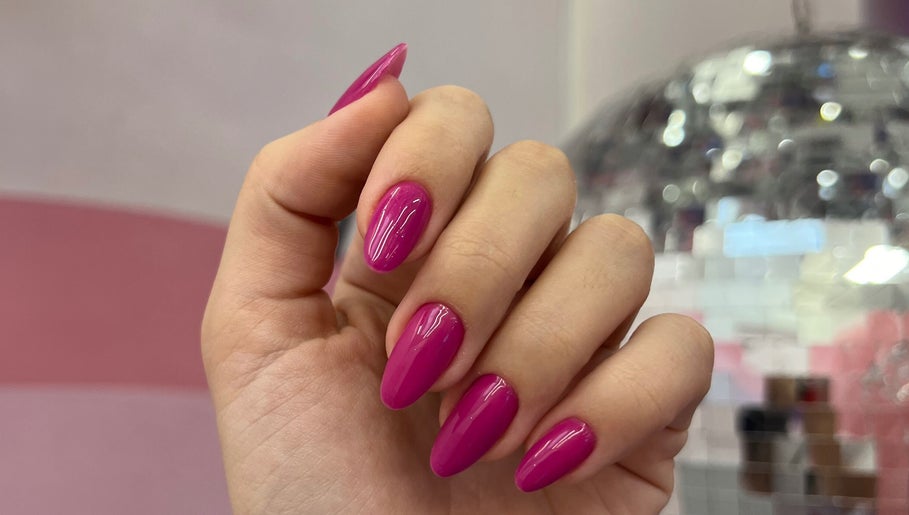 Close-up of vibrant pink nails at Studio Karla Horrana, Amsterdam, Noord-Holland, NL.