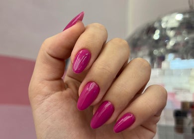 Close-up of vibrant pink nails at Studio Karla Horrana, Amsterdam, Noord-Holland, NL.
